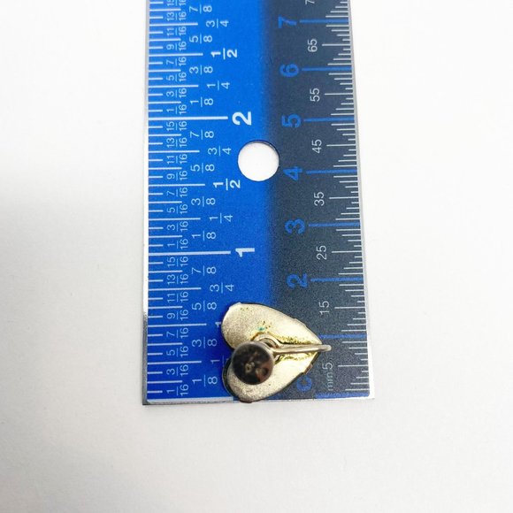 452 Three vintage Coro screw-back earrings